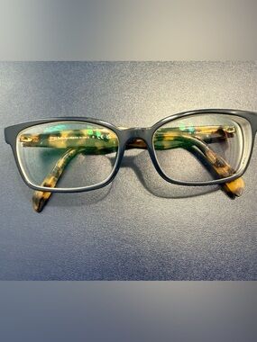 Prada VPR 18T eyeglasses with a tortoise shell frame color Used condition